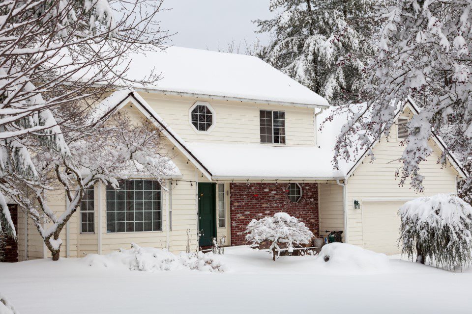 Home in winter snow